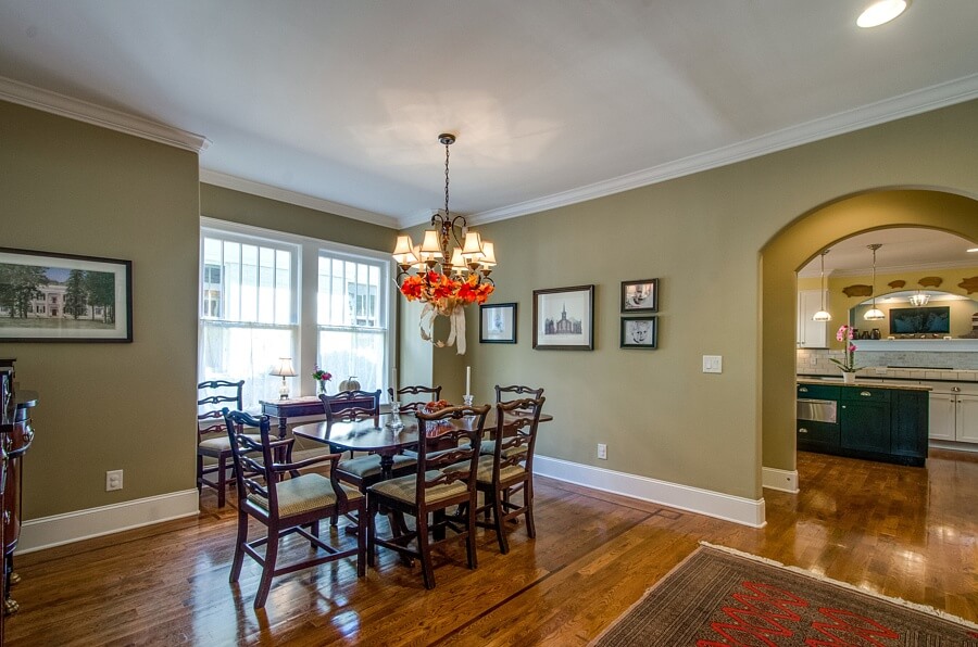 Beyond the living room entryway, you'll find the formal dining room, which is beautiful lit by natural light.