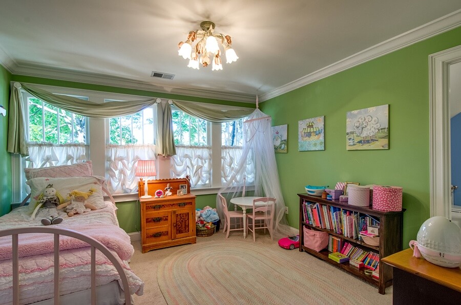 Two of the upstairs bedrooms share a bathroom, while the third bedroom has access to the hallway bathroom.