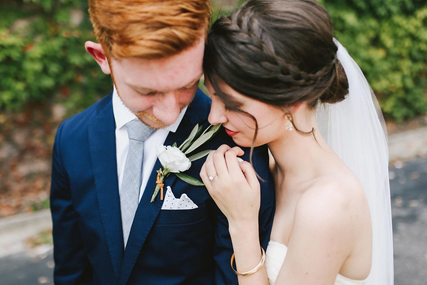Beautiful tresses + stylish wedding-day wardrobes + elegant accents + true love = a romantic moment worthy of a perfume ad!