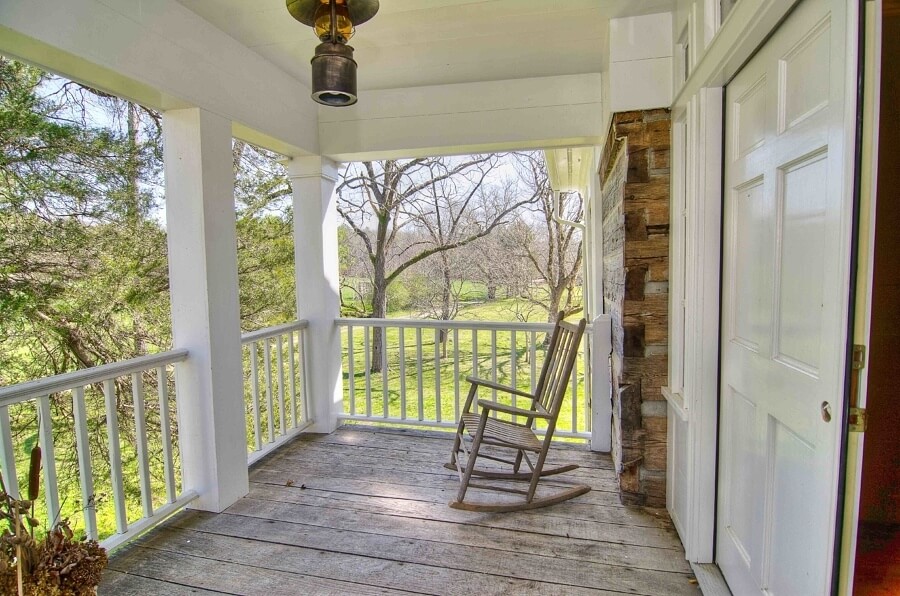 Owner Kerry Hix researched porches of that era before building the ones on the property today, since the structure was falling apart when he bought it, and had no porches intact.