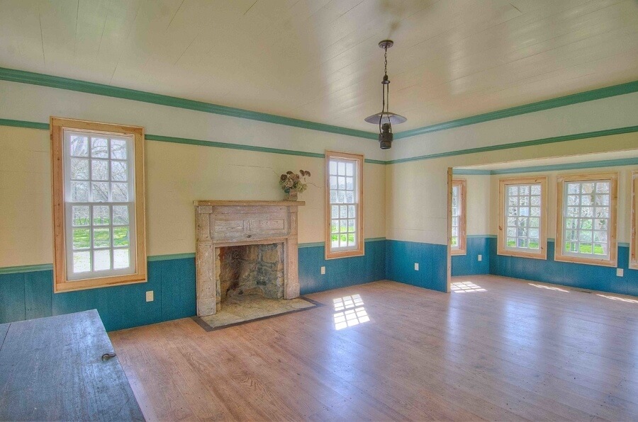 The house has multiple fireplaces, all now safely repaired and working.