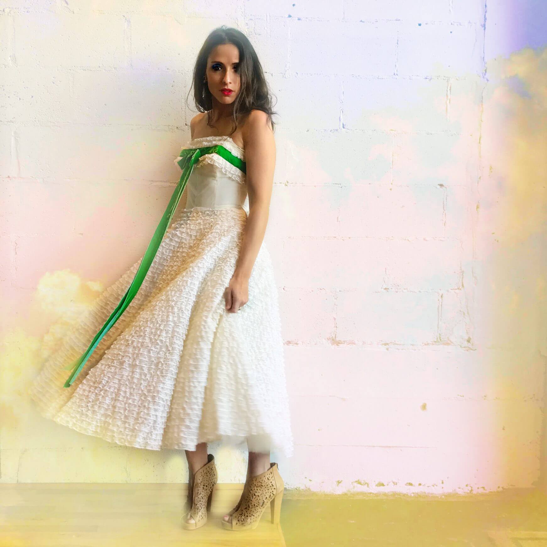 This dress is like a delicate and feminine, 50s-style reimagining of Scarlett O'Hara's iconic white-and-green dress. This dress is like a delicate and feminine, 50s-style reimagining of Scarlett O'Hara's iconic white-and-green dress.