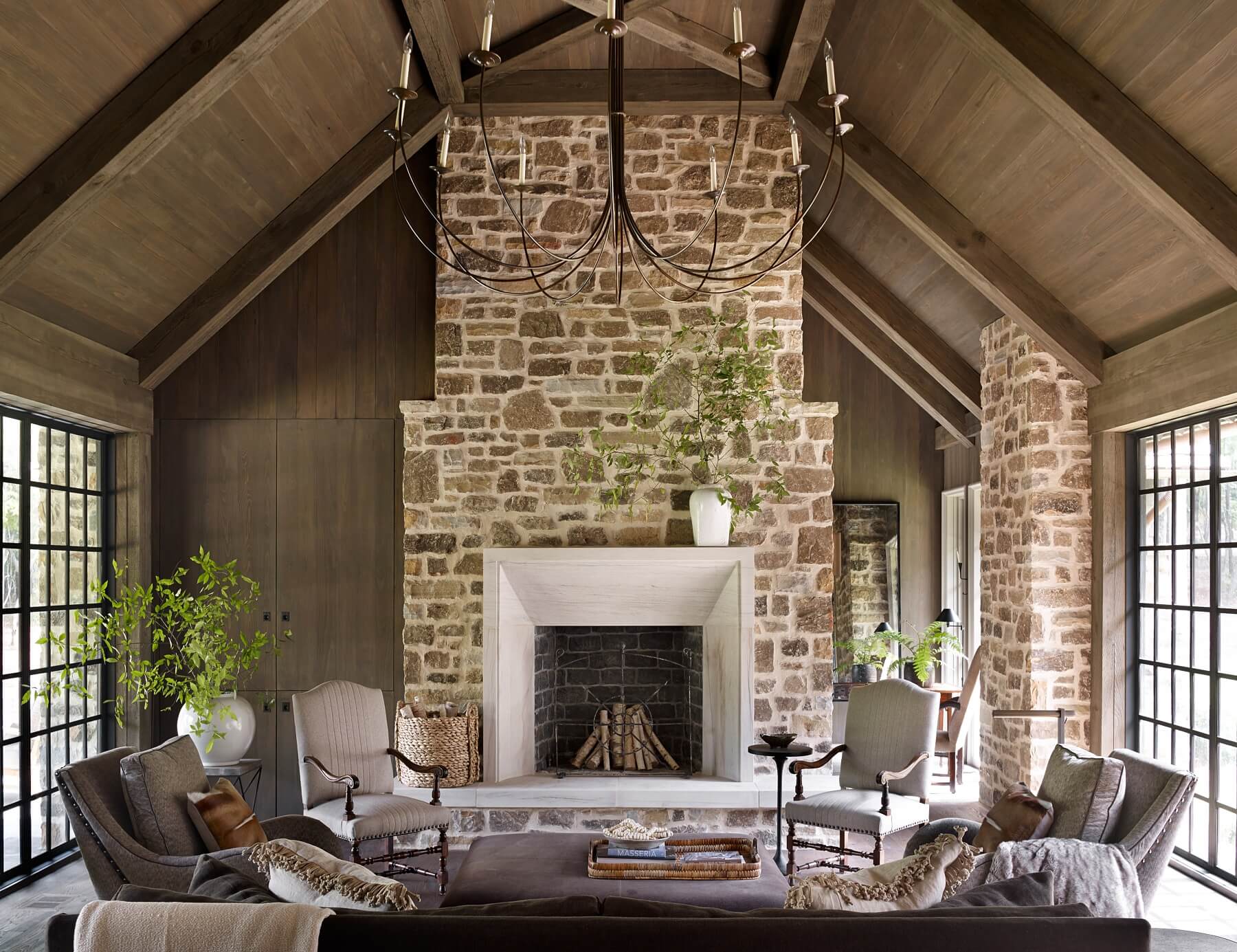 "The great room is my favorite room for sure," says Jeffrey. "The wonderful see-through space, steel windows and giant fireplace make it my favorite."