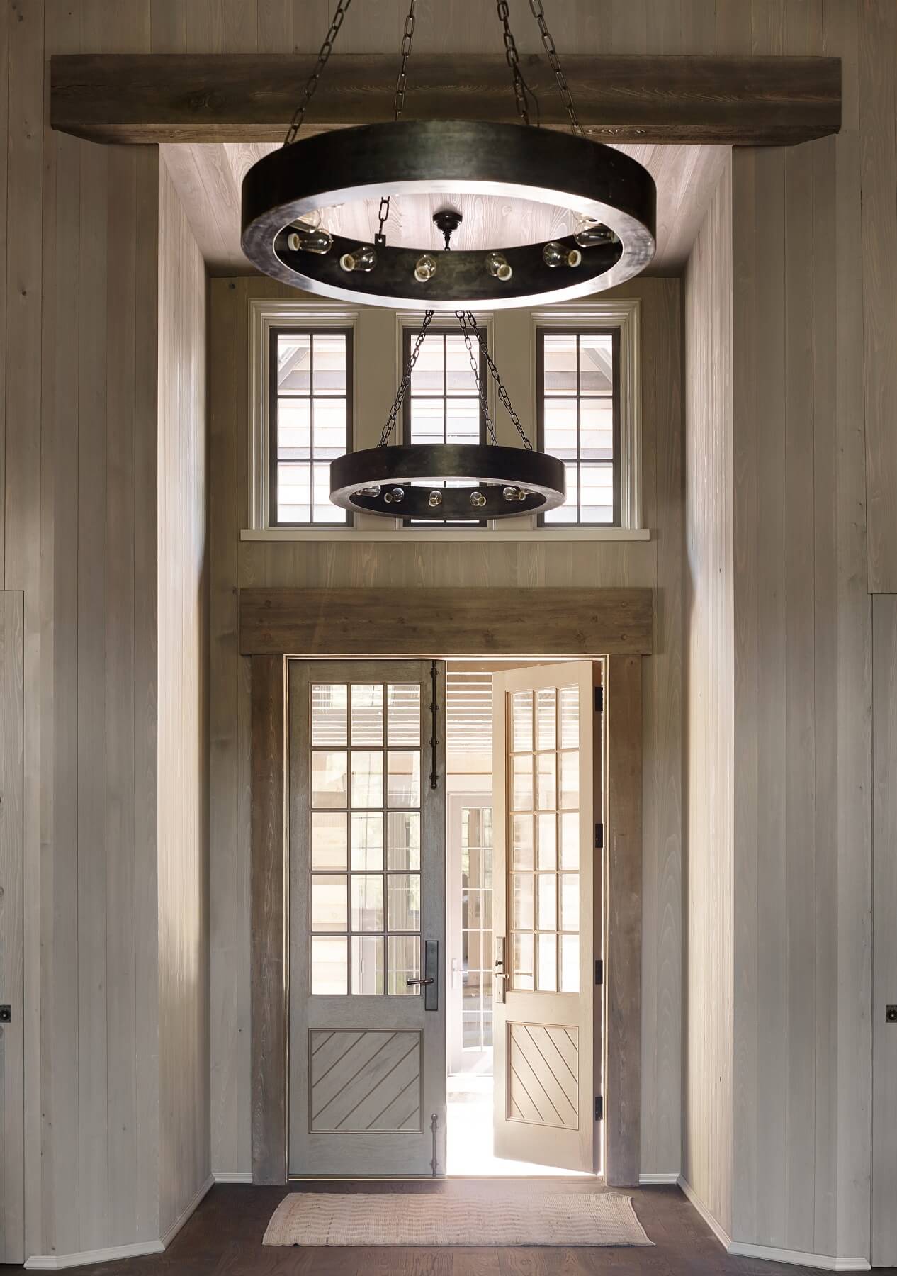 Light floods the foyer for a calming feel, a perfect 'welcome home'!