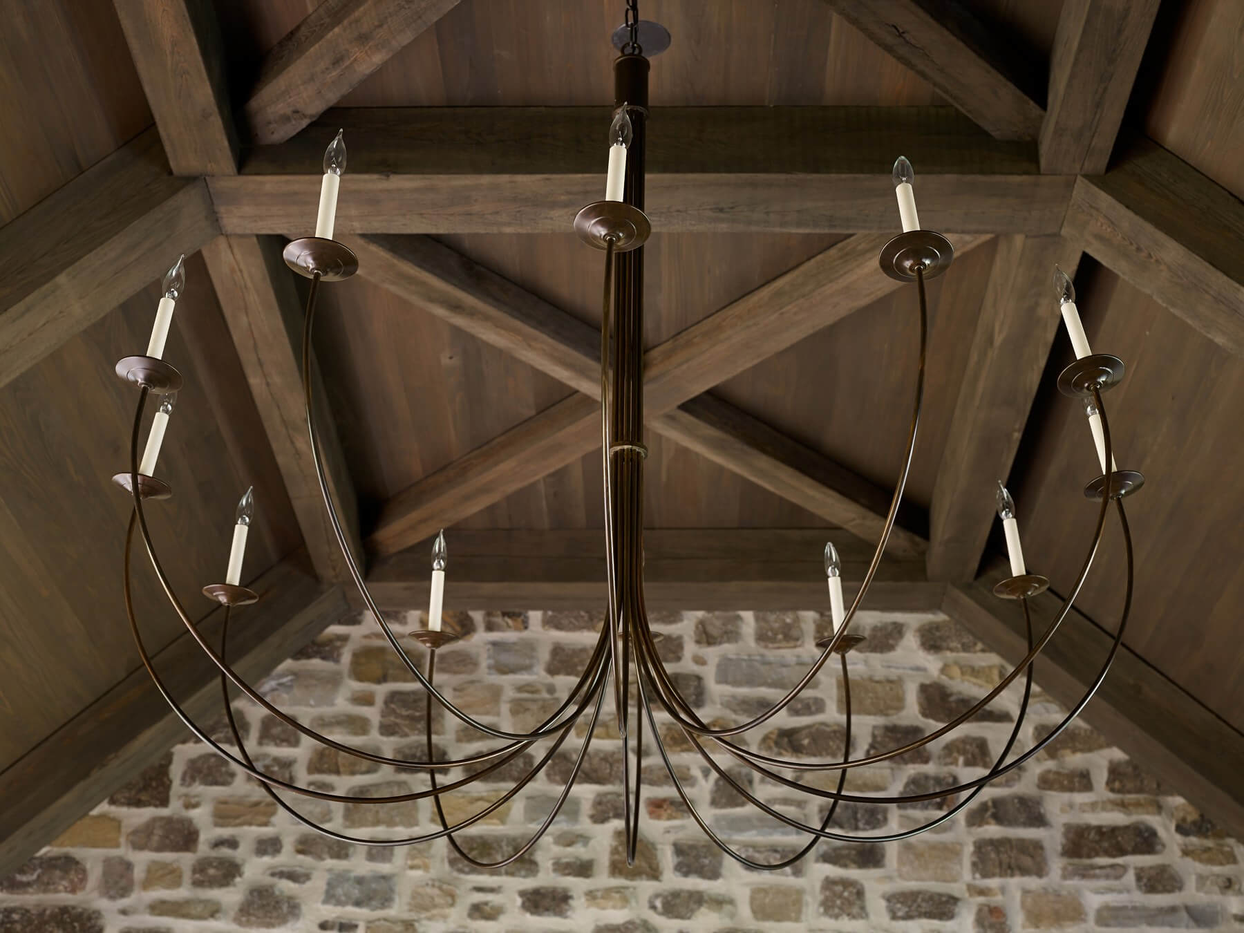 "Personally, I loved the custom-stained woods and waxes we used in each room," says Beth. "The custom wood colors took on their own look, resembling rows of light and dark chocolates or yards of rich velvet that covered the walls or ceilings." 