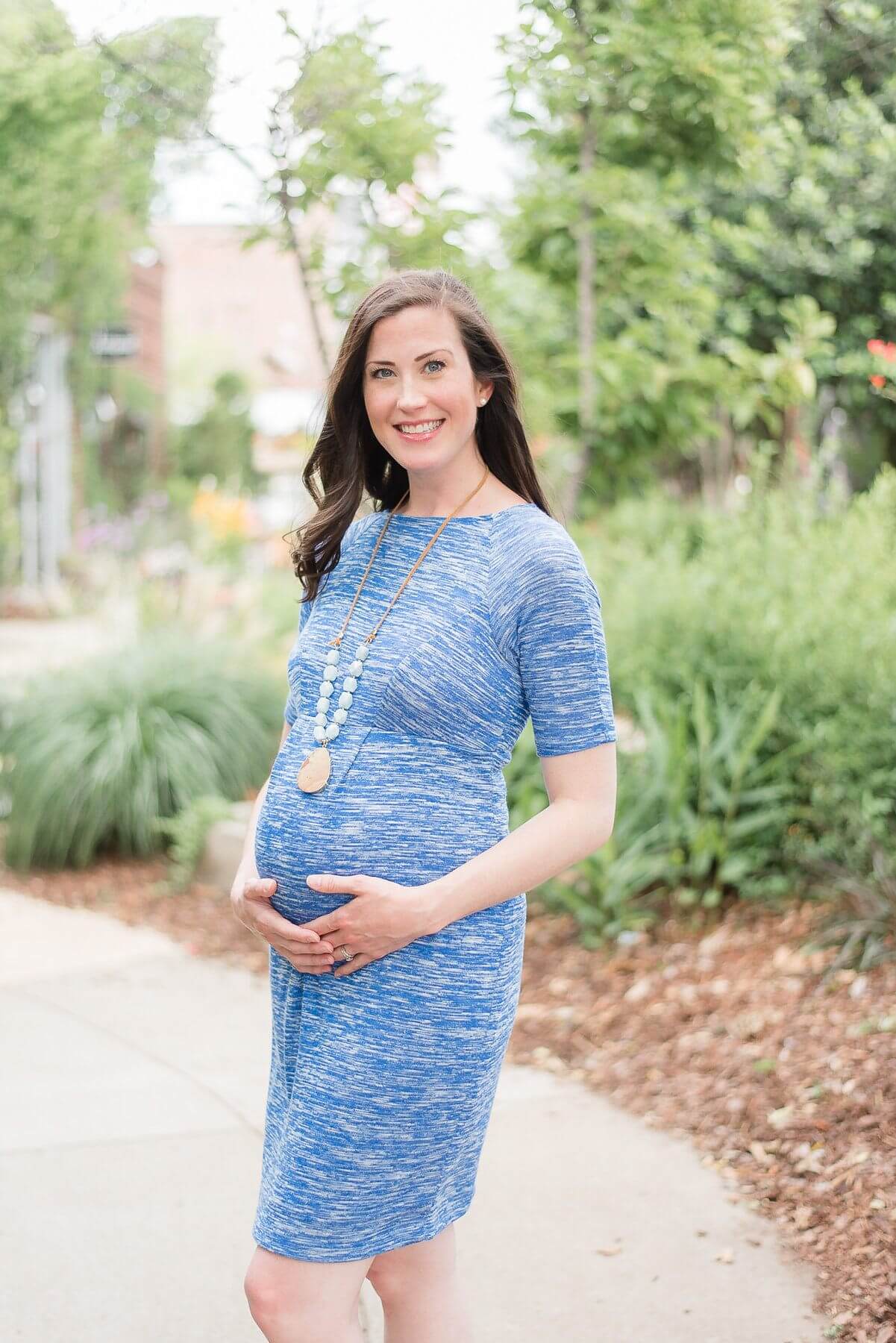 From The Swanky Stork: Bobo Blue Dress, $129; Blue and gold stone necklace, $42 From The Swanky Stork: Bobo Blue Dress, $129; Blue and gold stone necklace, $42