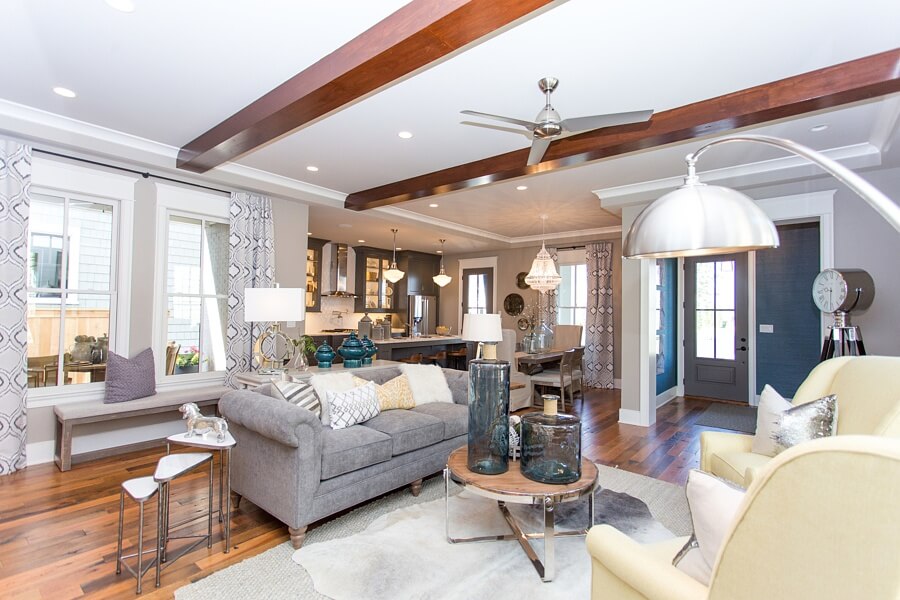 The open floor plan of this Norton Commons home is a typical design of a community created for connection and socializing. This combined great room, dining area and kitchen create a flow perfect for entertaining. 