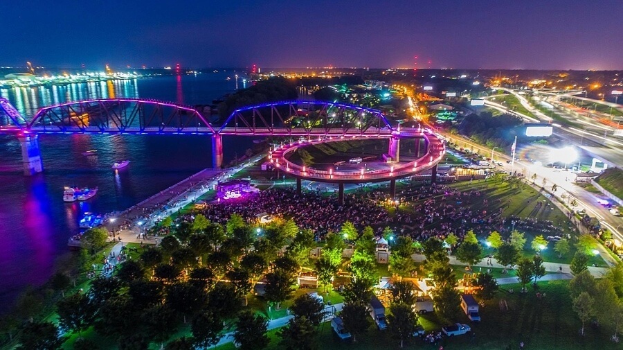 A night view of Waterfront Wednesday crowds and the lights of the Big Four Bridge at night make a spectacular sight