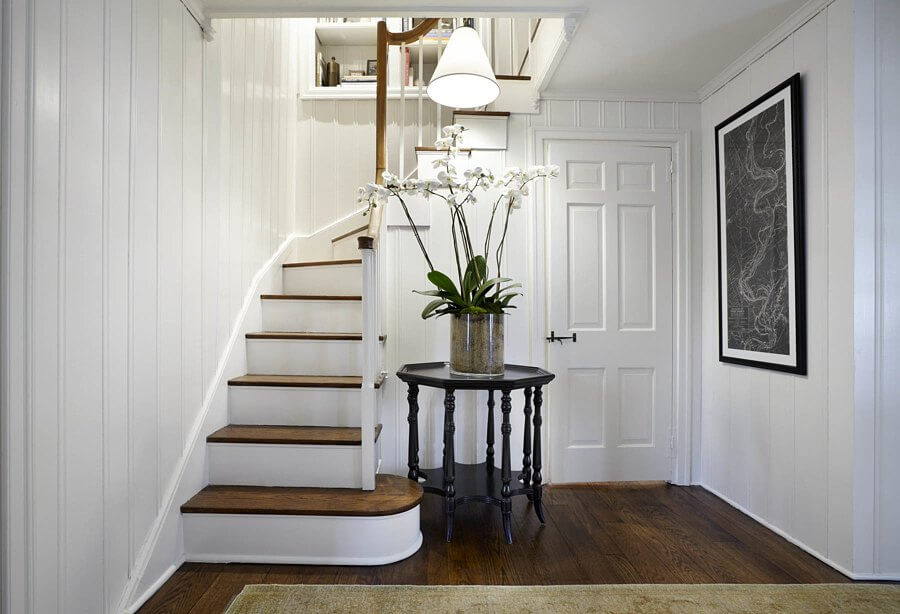 The foyer just inside the front door at The White House at Wilson offers a glimpse at how the home has been tastefully designed by Memphis designer Lisa Mallory. Fresh greenery can be found throughout as well.