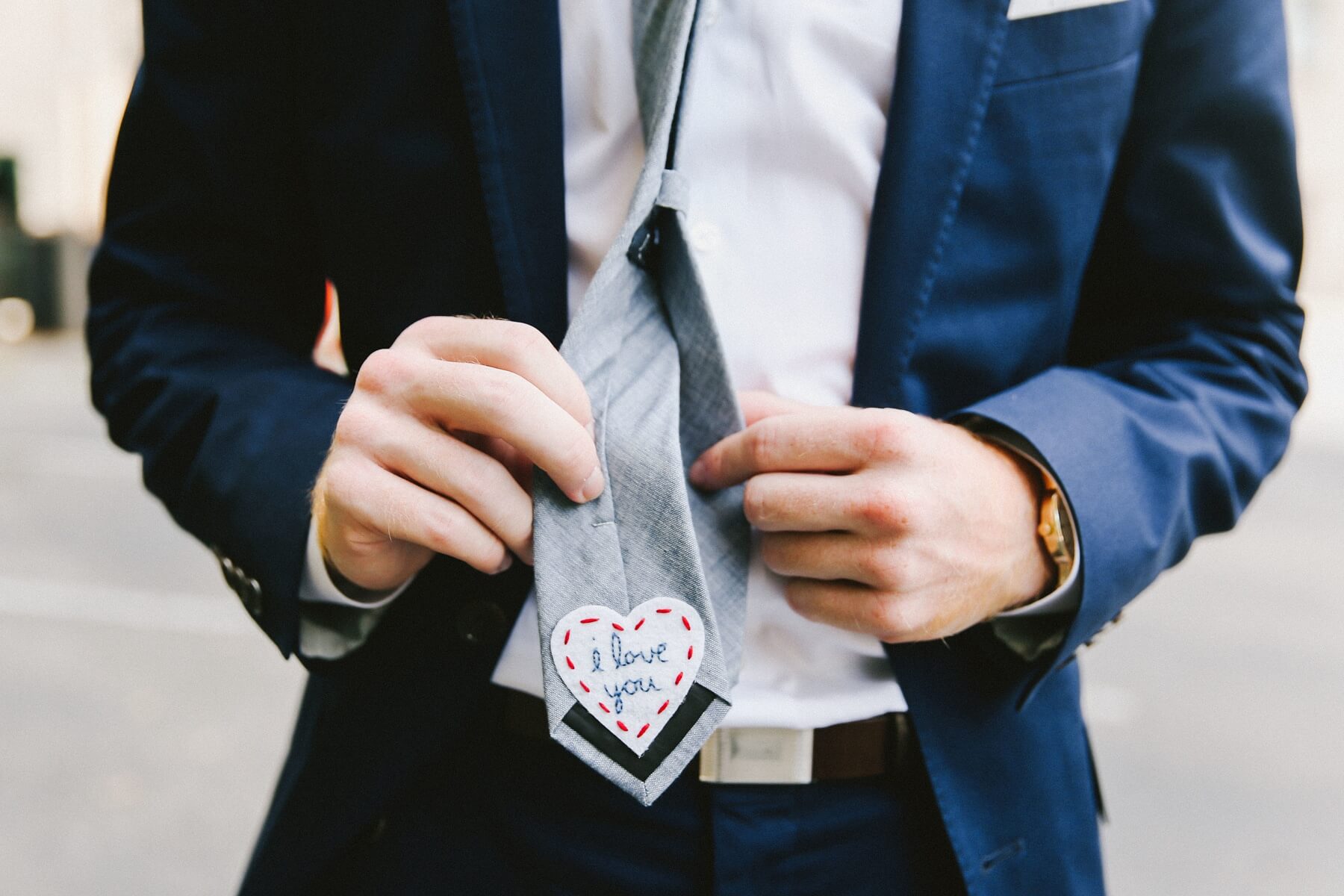 Natalie surprised her groom with this hand-embroidered patch on the back of his tie. It was one of their favorite little details from the day, and is definitely one of ours, too!