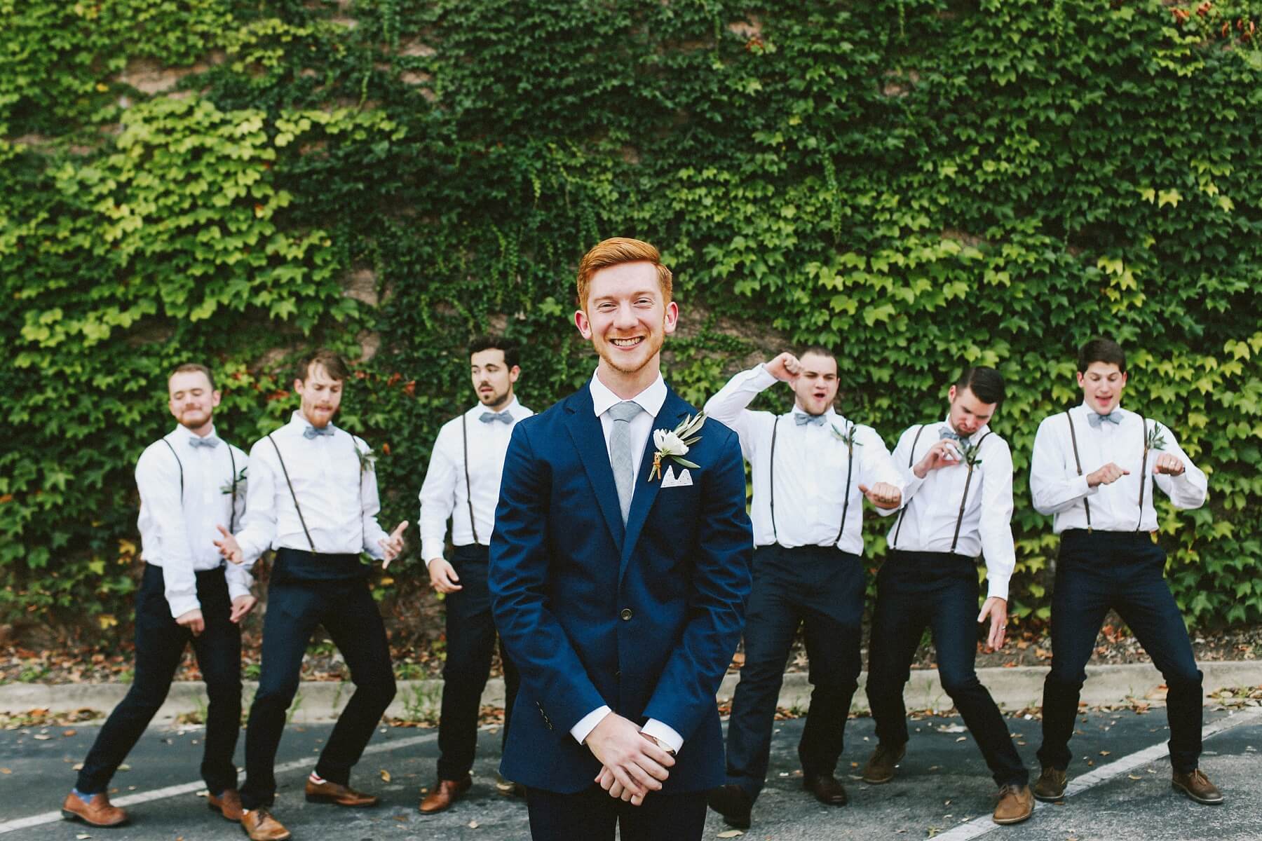 The goofy groomsmen are at it again, giving their groom friend the chuckles!