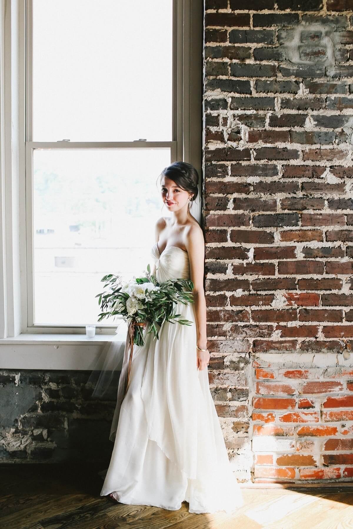Natalie’s Sarah Seven dress was actually the first she tried on. The romantic draped gown with a flattering sweetheart neckline and gathered waist suited this laid-back bride perfectly.