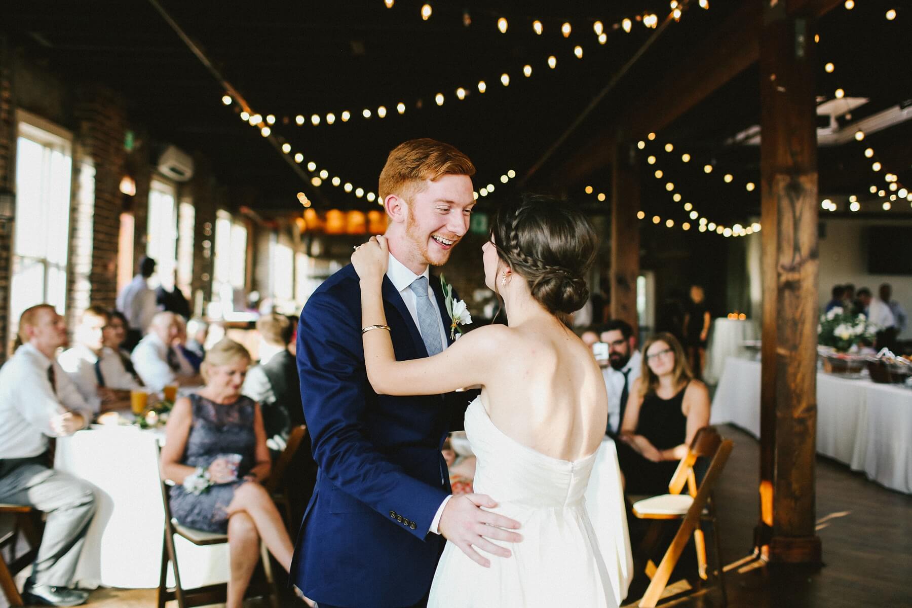 The bride and groom share their first dance to Maroon 5’s cover of “Let’s Stay Together.” Sweet!