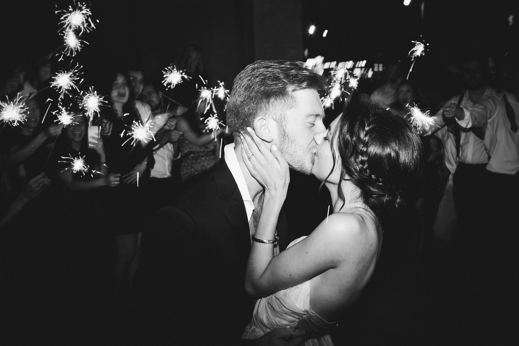 With a sparkler send off, the new Mr. & Mrs. Beasley begin their life together.