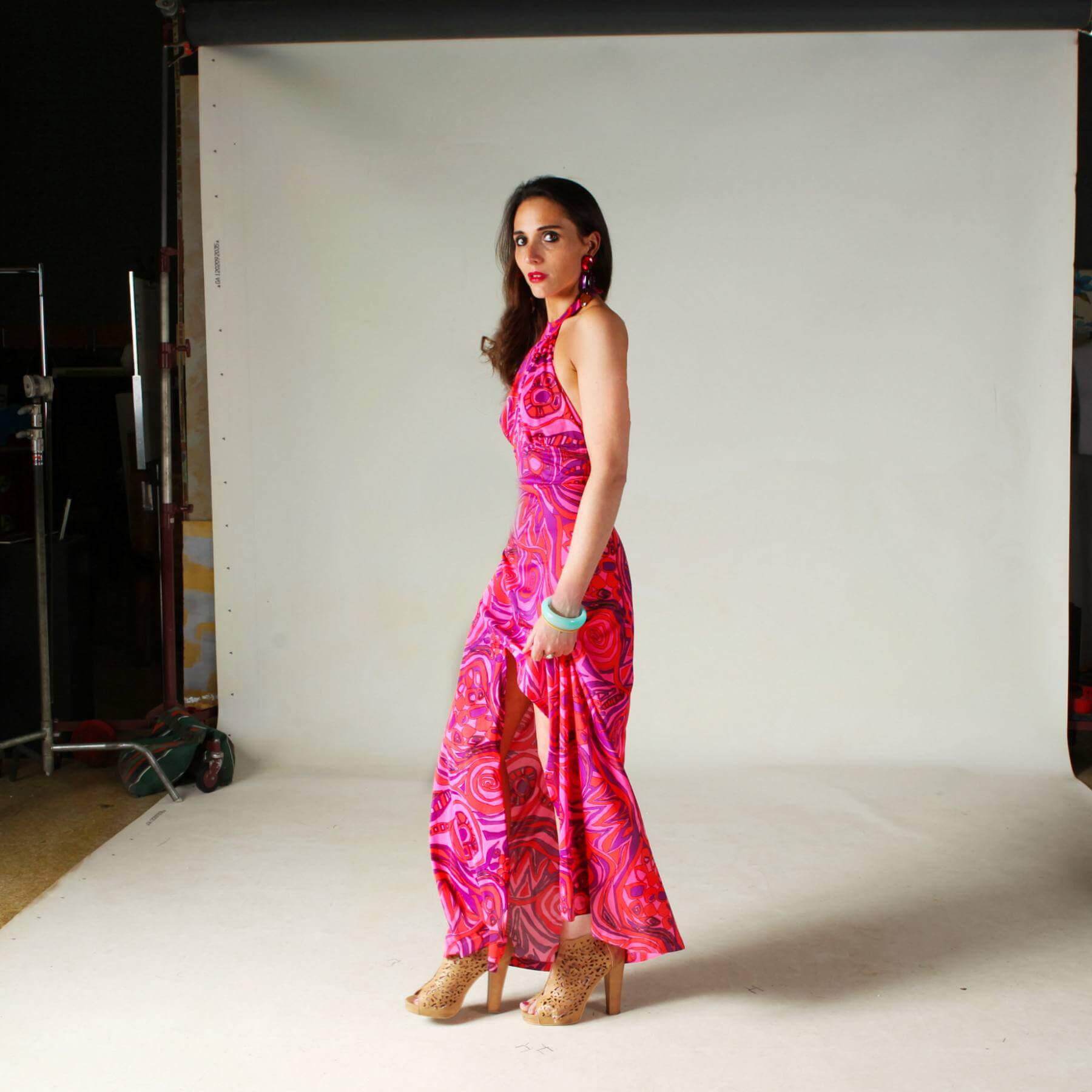 Late 1960s hot pink, mod-print maxi dress with smoky sky blue Bakelite bangle bracelet | Image: Brent Shrewsbury Late 1960s hot pink, mod-print maxi dress with smoky sky blue Bakelite bangle bracelet | Image: Brent Shrewsbury