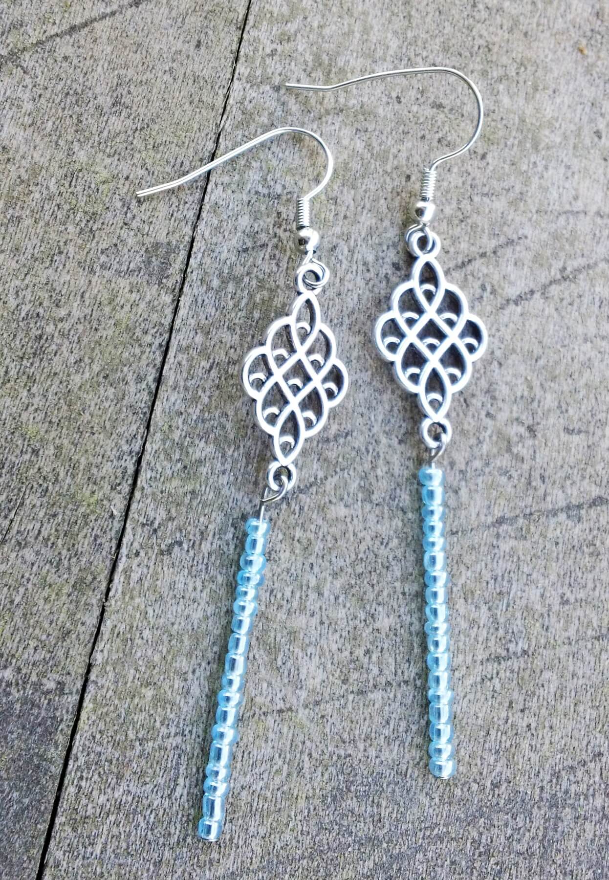 Silver and blue-beaded earrings, $7, on Valerie Shaver’s Etsy shop