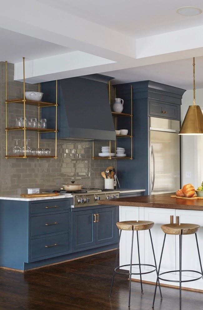 "We had those brass shelves custom made by Brandino Brass," says Marianne. "I swear I get about three emails a week from people all over the country asking where we got those shelves." People see the home on Pinterest, Houzz, One King's Lane and Apartment Therapy, and, as a result, have commissioned similar shelving from Birmingham's own Brandino Brass. Image: Jean Allsopp 