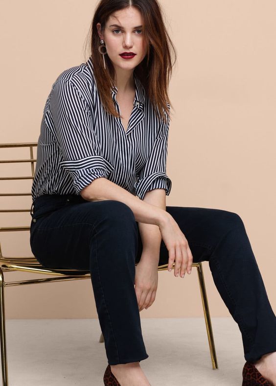 A great pair of dark wash jeans is a must-have for every woman. Image: Mango