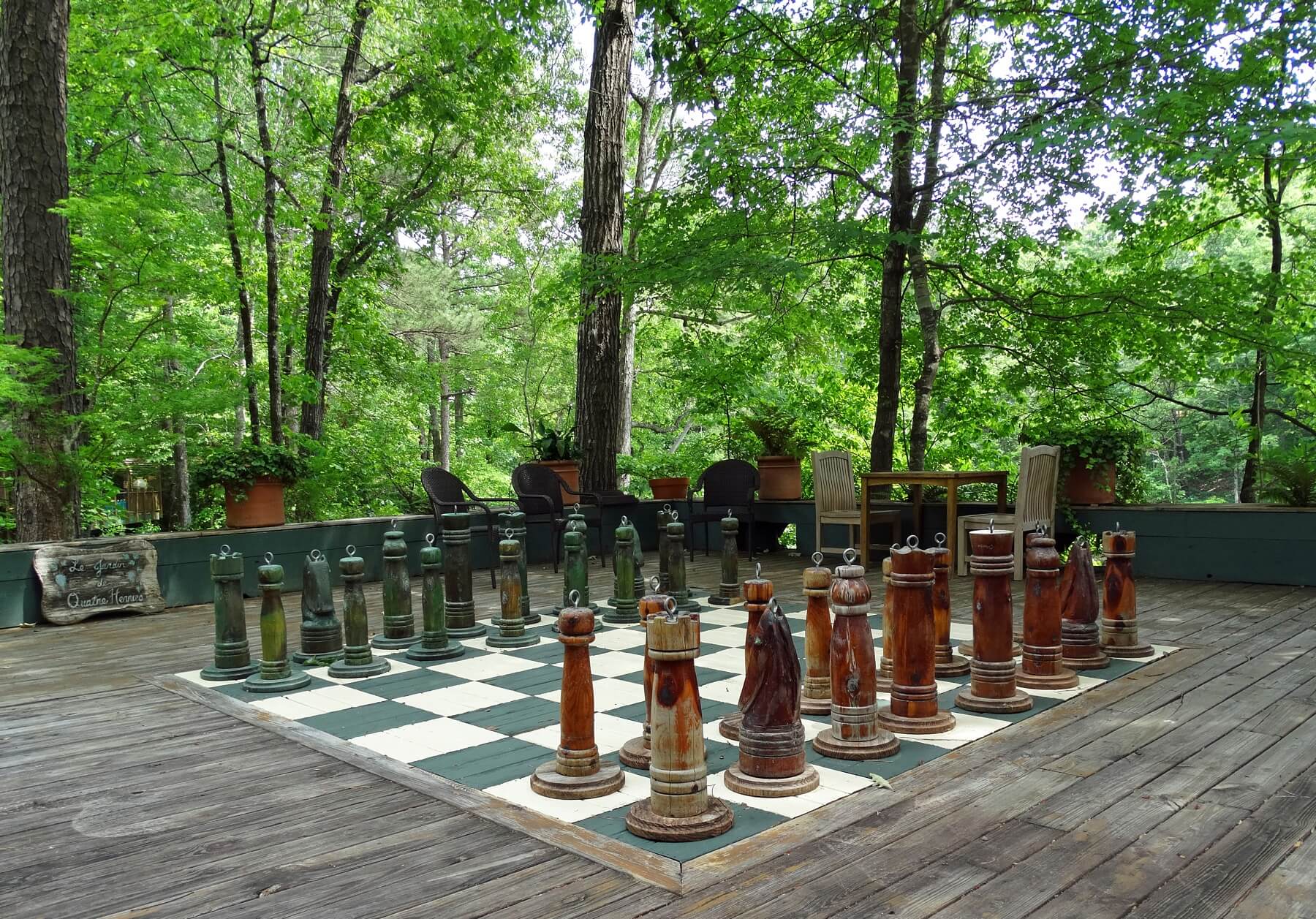 "A couple of big cedar trees blew down near Grace Church, and I got that cedar built into those chess men," says Jim. "And so it’s kind of like one garden contributed to another." 