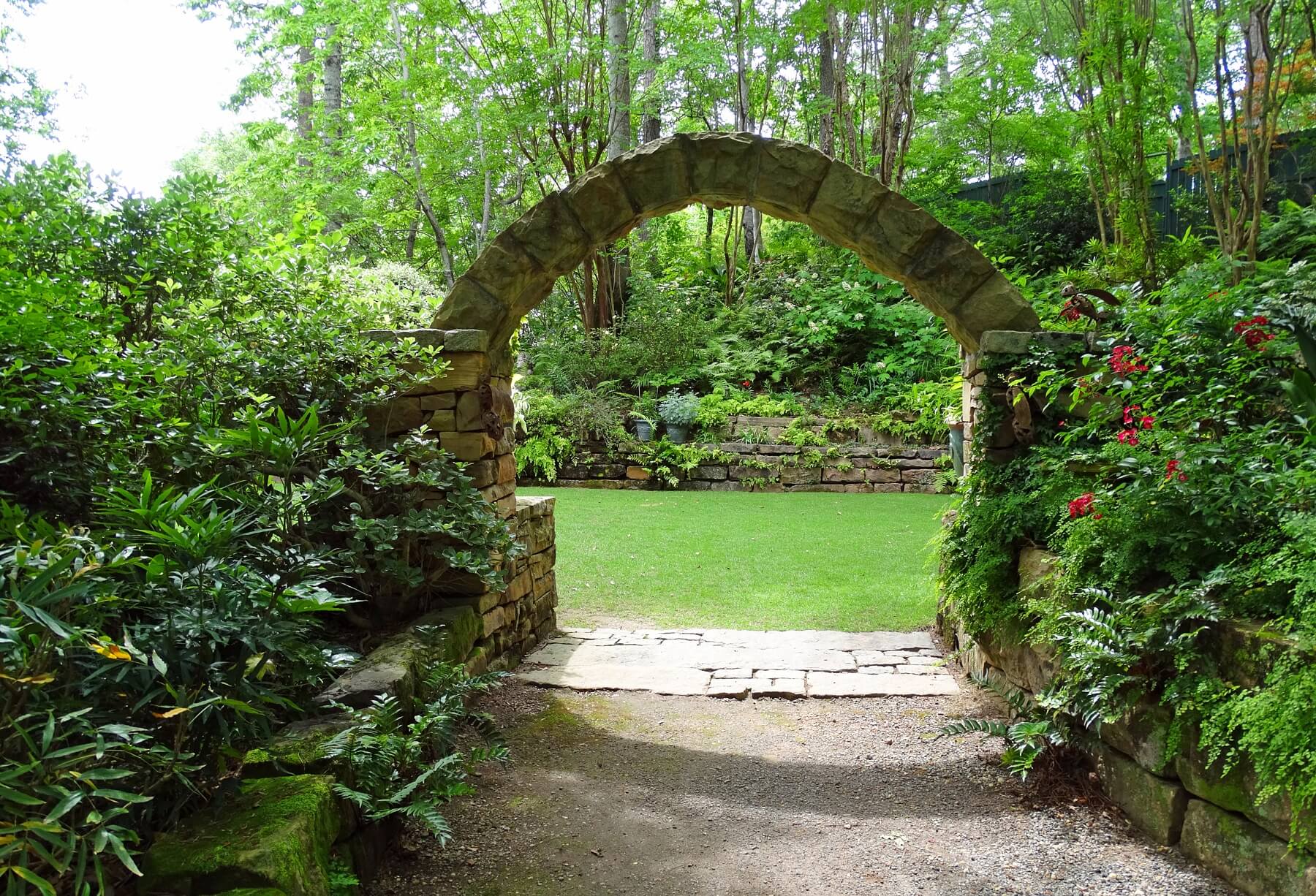 This beautiful stone archway is a grand entrance into this green space.