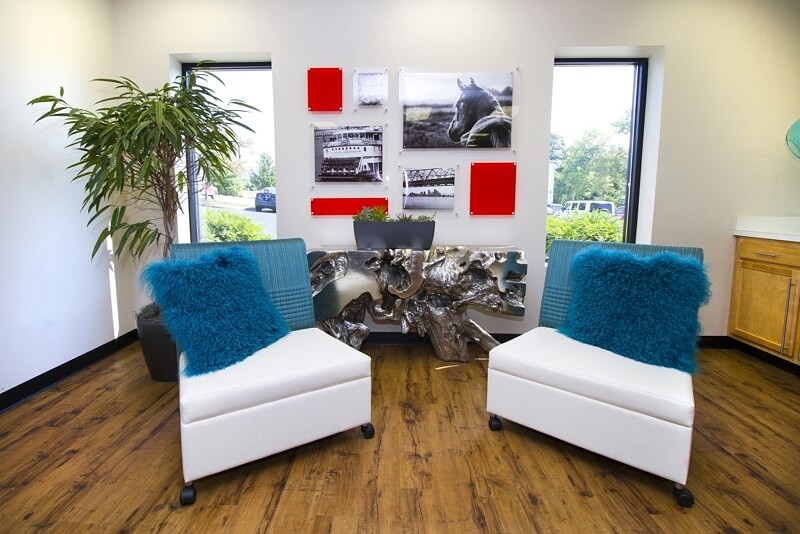 LL&A made sure to incorporate sleek, black and white thoroughbred photographs throughout the space to highlight the owners' love for their own horses.