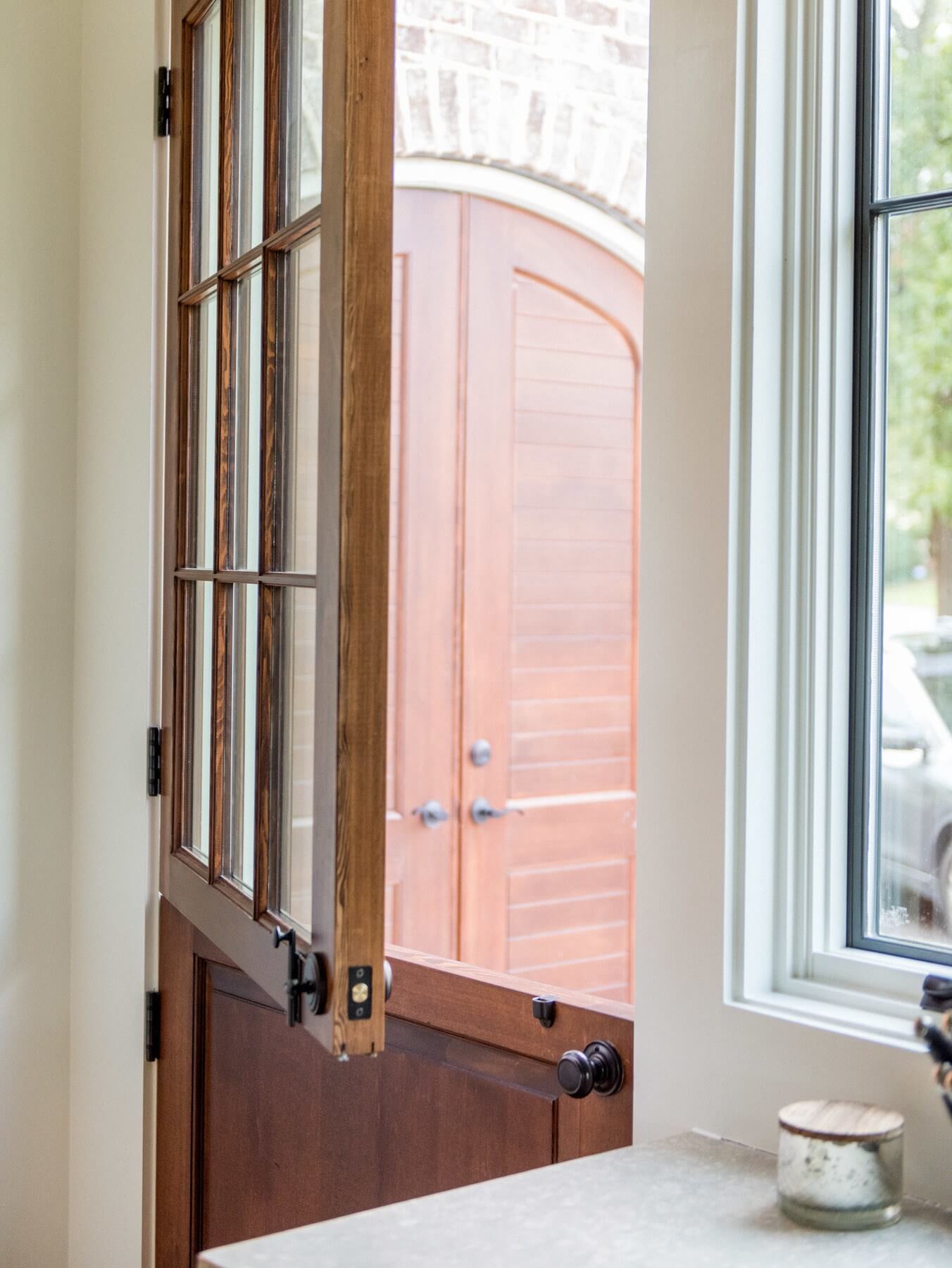 The Dutch door exudes a romantic, Old World feel and a refreshing connection to the great outdoors. 