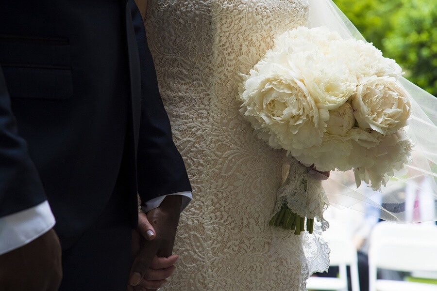 “This lace here is from my mother’s sister, who I was named after. She passed away from leukemia. And that’s the lace from her gown that I held around my bouquet,” Stacy says. It was Stacy’s “something old” from the 1970s. “I just loved it,” she says. Stacy’s “something borrowed” was the broach in her hair from her sister Leslie. And the bride’s “something blue” was her garter. “This lace here is from my mother’s sister, who I was named after. She passed away from leukemia. And that’s the lace from her gown that I held around my bouquet,” Stacy says. It was Stacy’s “something old” from the 1970s. “I just loved it,” she says. Stacy’s “something borrowed” was the broach in her hair from her sister Leslie. And the bride’s “something blue” was her garter.