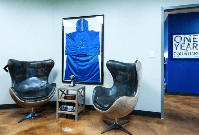 Showcased here is a blue boxer's robe that Muhammad Ali, a client of Boxcar PR, wore. Image: Boxcar PR