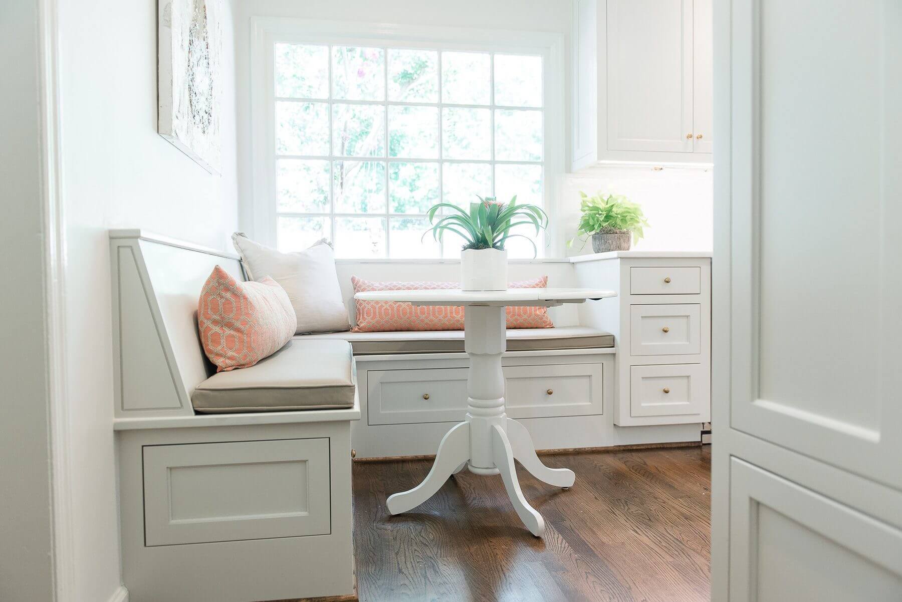 When working from home, Ashley loves to set up her laptop at the banquette and admire her dream kitchen.
