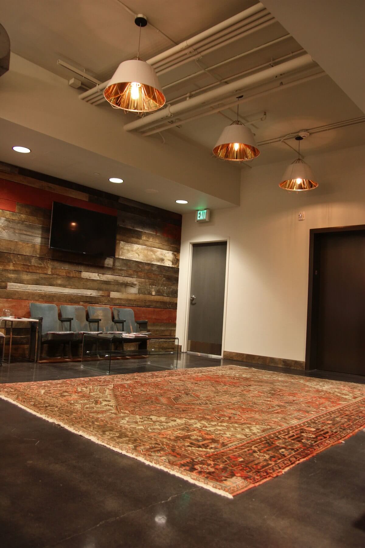 The lobby at Berkadia features sleek lighting that complements the modern yet warm ambiance. The lobby at Berkadia features sleek lighting that complements the modern yet warm ambiance.