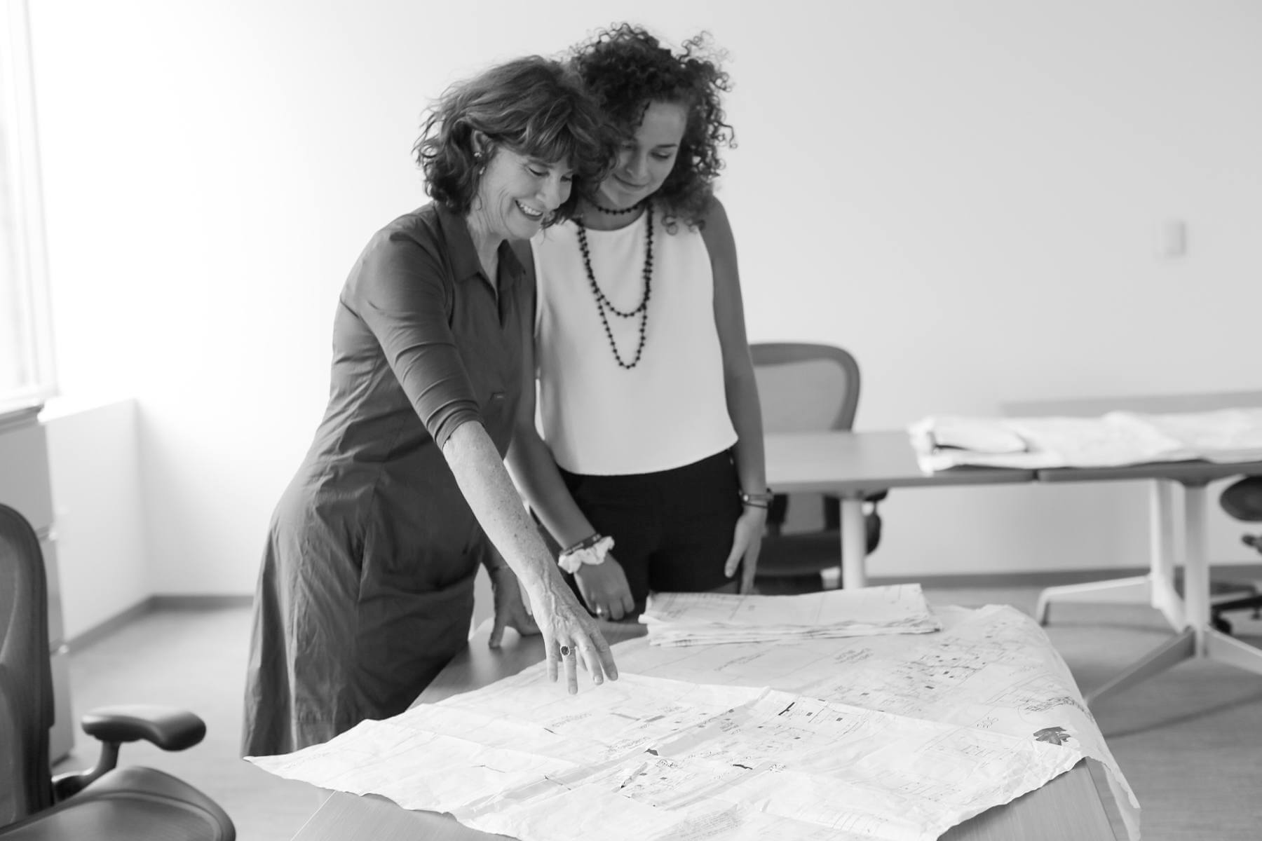 Dorothy and a colleague examine a blueprint for the exciting new Ballet Memphis facility.