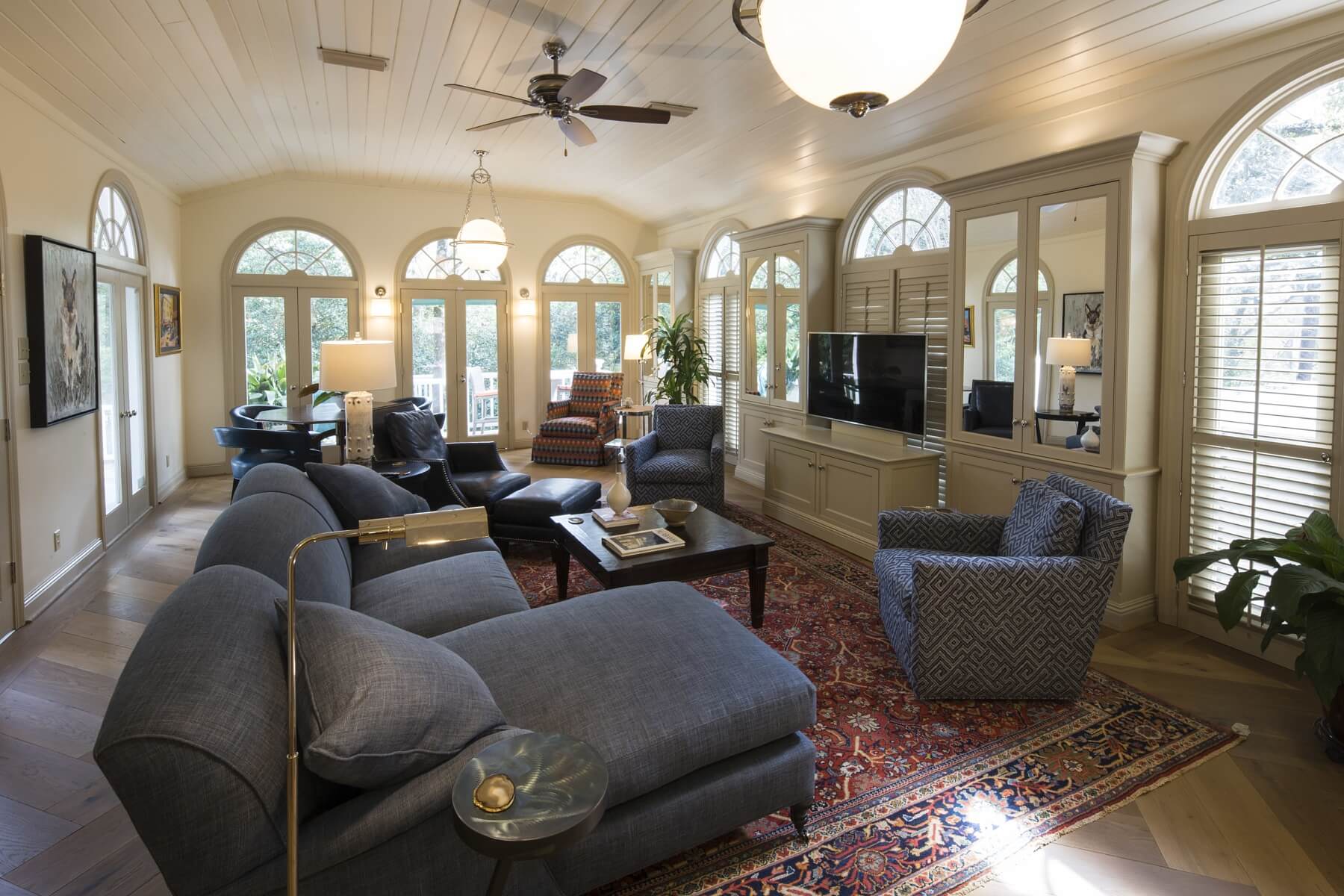 The living room flows directly into the kitchen and then dining room.