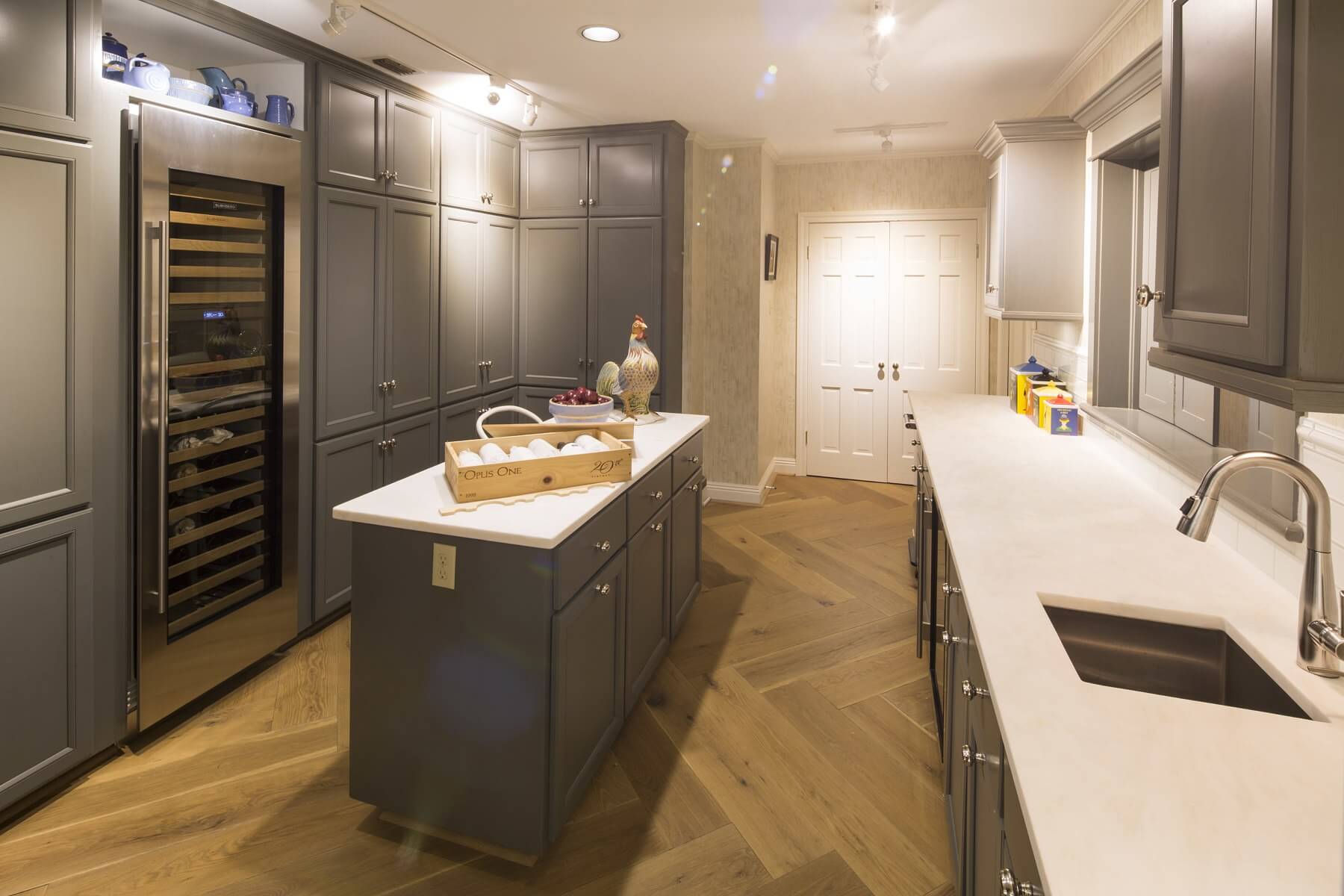 Part of the design features a grand butler's pantry complete with a wine cooler.