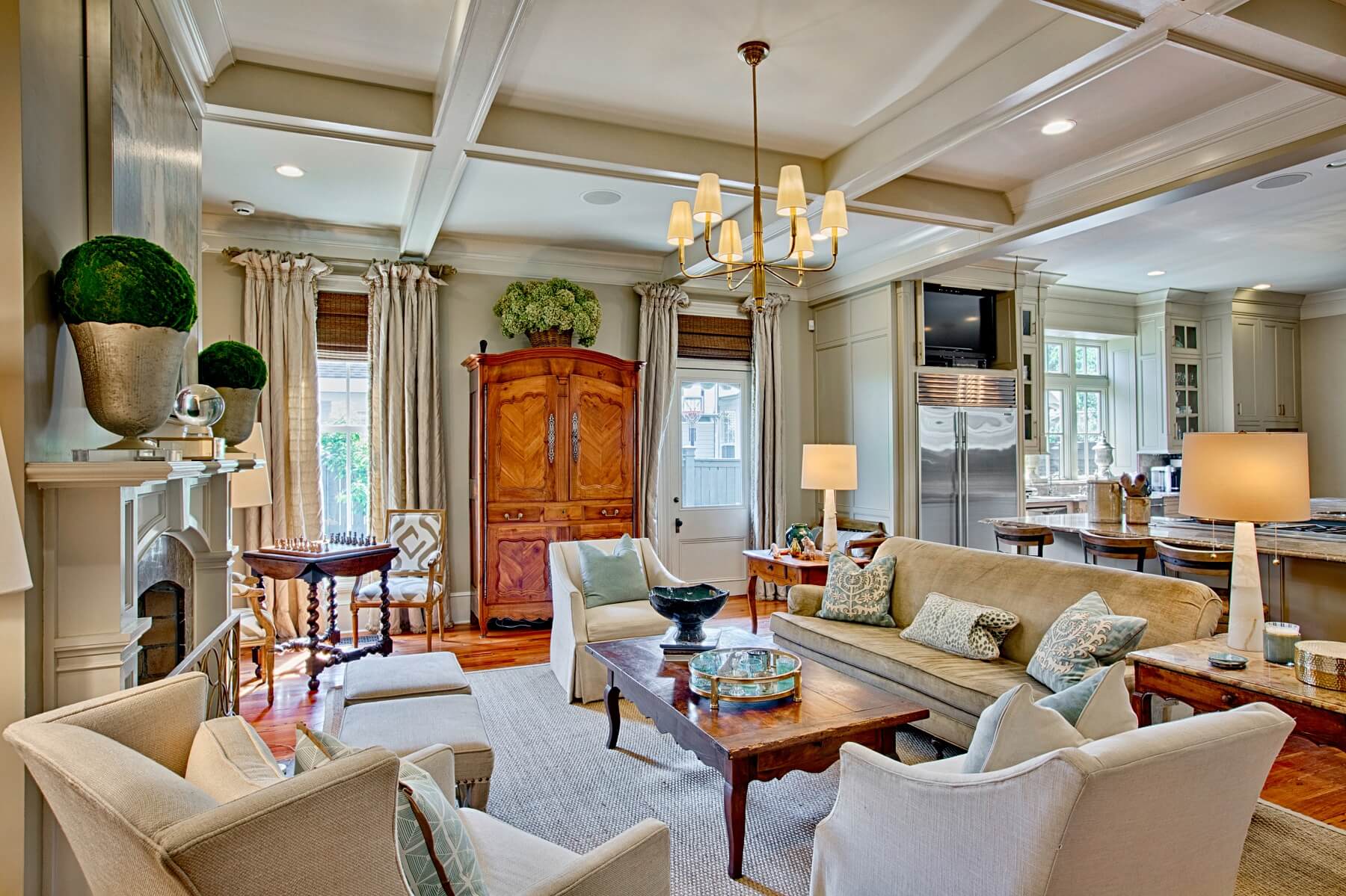 After: With removal of the wall that housed the island, the room is transformed. "My favorite part of the project was creating a finished product that was functional yet comfortably elegant — and happy clients, of course," says Beverly.