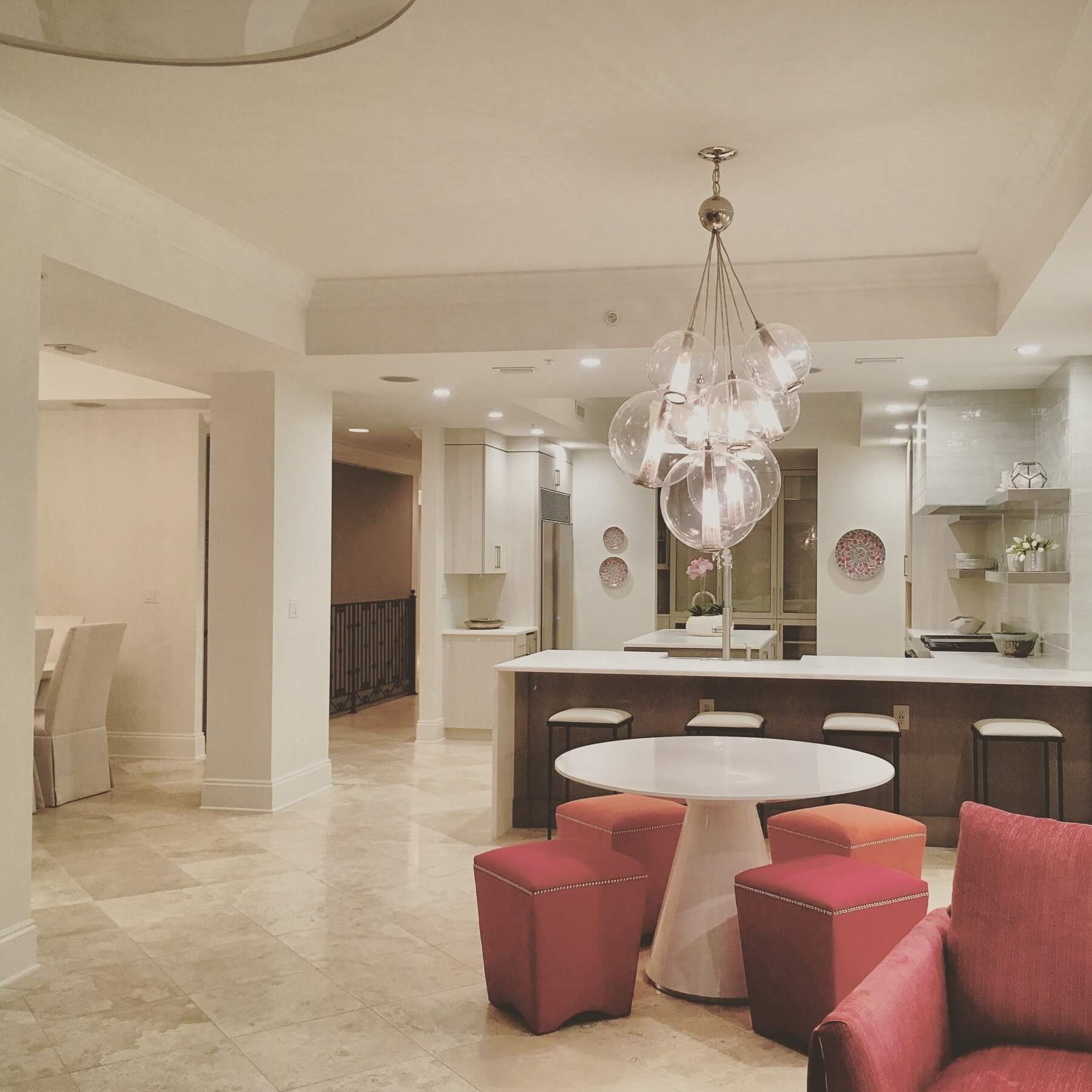 After: The kitchen was completely changed, including removing doorways to a pantry and storage space creating a single large area.