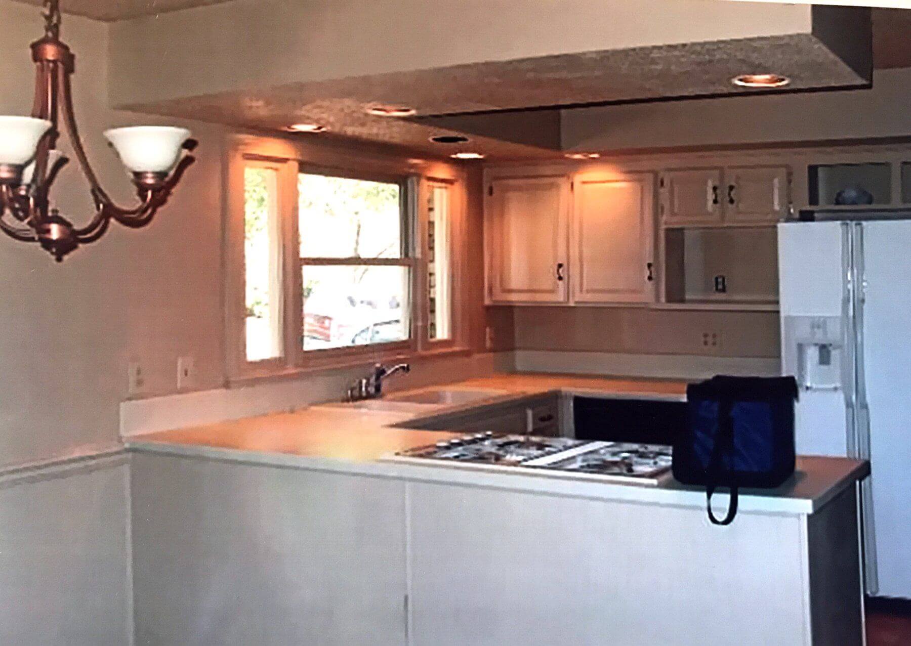 Before: The "before" kitchen has a very dated feel.
