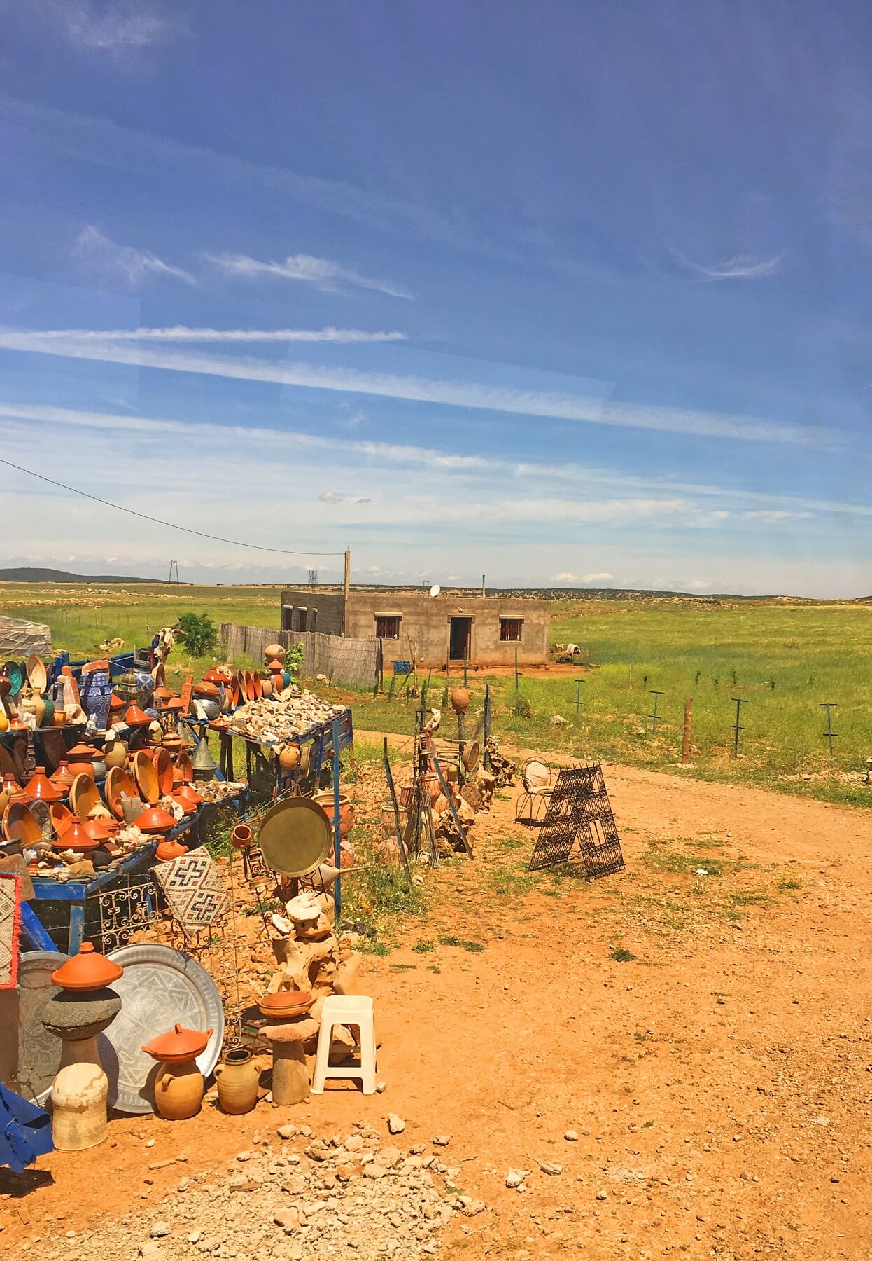 The group stopped at this roadside setup in the mountains to peruse their handmade tagines and local honey.
