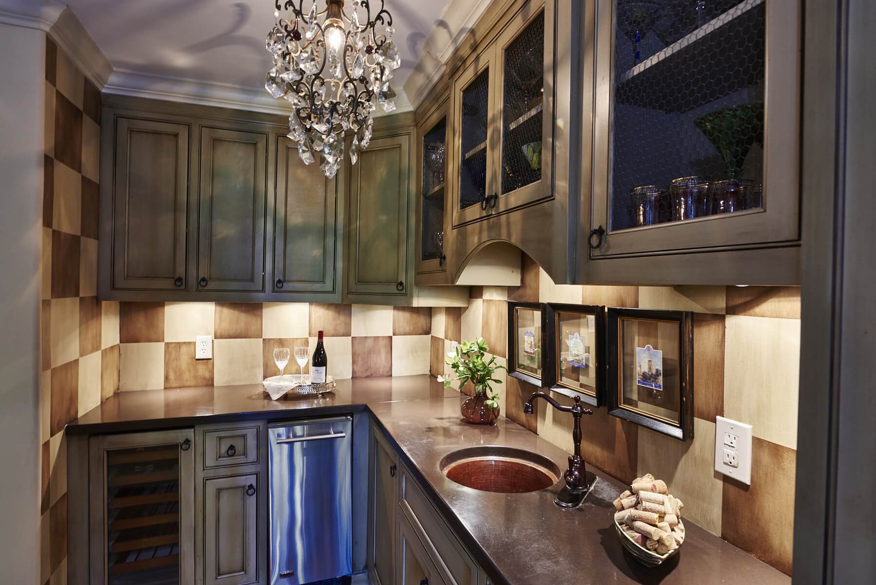After: The rustic open butler pantry exudes an Old World charm with modern touches like its ice maker and wine cooler.