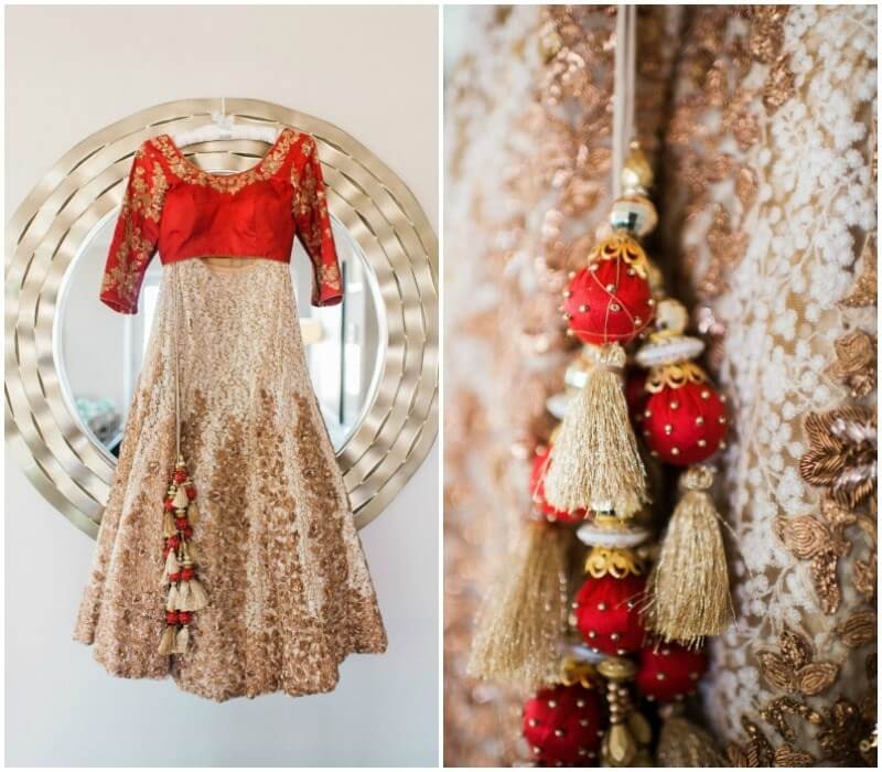Susan initially envisioned herself wearing an all-red lengha for the wedding ceremony. “That ended very quickly when I laid eyes on this one lengha from Shyamal and Bhumika,” Susan says. “The skirt was filled with beautiful antique gold threadwork and the dupatta was made of soft net that draped perfectly over the shoulder. At that moment I knew, that was the one. I wanted to add a pop of color in the lengha, so I opted for a red blouse.” Susan initially envisioned herself wearing an all-red lengha for the wedding ceremony. “That ended very quickly when I laid eyes on this one lengha from Shyamal and Bhumika,” Susan says. “The skirt was filled with beautiful antique gold threadwork and the dupatta was made of soft net that draped perfectly over the shoulder. At that moment I knew, that was the one. I wanted to add a pop of color in the lengha, so I opted for a red blouse.”