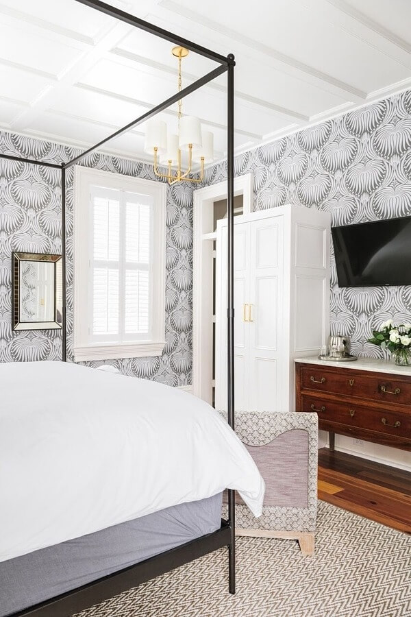 An antique marble-topped sideboard in the guest bedroom brings in an aged patina. An antique marble-topped sideboard in the guest bedroom brings in an aged patina.