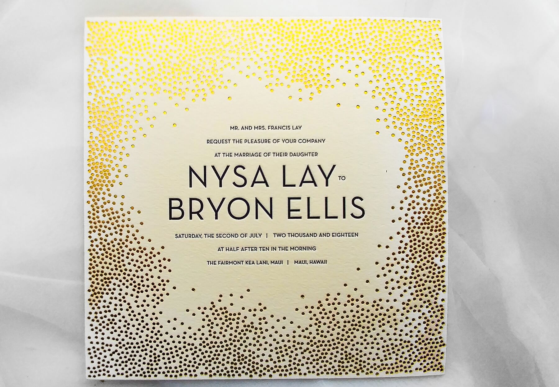 Exuding a Gatsby-esque glamour, this square card with engraved gold confetti and sleek capitalized lettering makes a bold statement. stationery