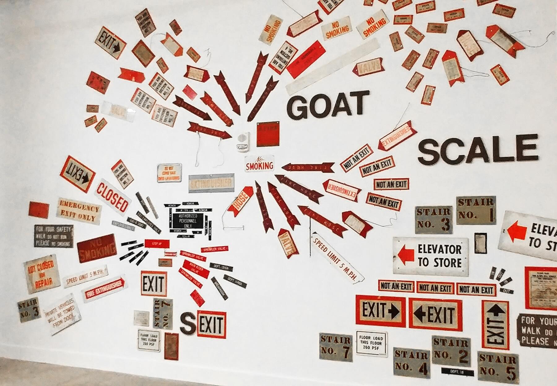 In the sprawling first-floor atrium, an art installation of found vintage signs from the old Sears building Crosstown Concourse — In the sprawling first-floor atrium, an art installation of found vintage signs from the old Sears building