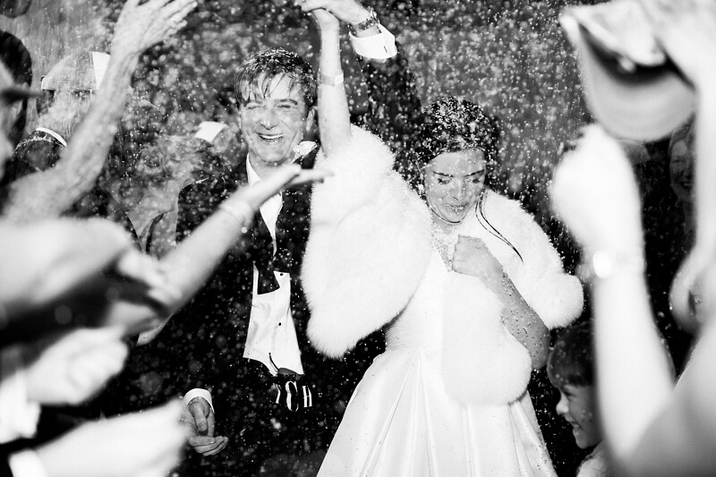 True to her classic aesthetic, Miller wanted to have a traditional rice-throwing exit, but since throwing actual rice outside is no longer allowed, they settled for synthetic rice instead. This photo absolutely nails that classic look!