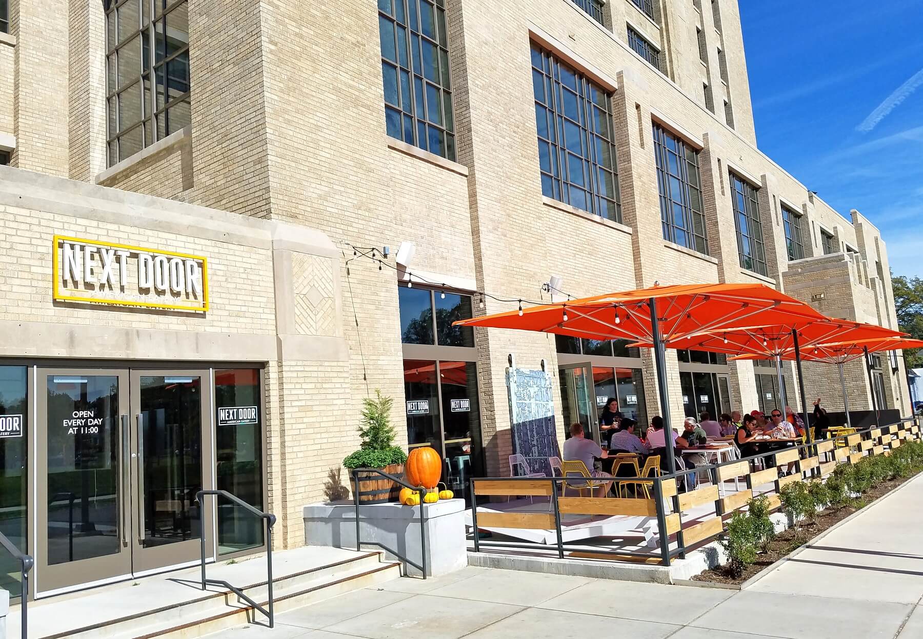 Enjoy an al fresco afternoon bite on the patio at Next Door American Eatery. Crosstown Concourse — Enjoy an al fresco afternoon bite on the patio at Next Door American Eatery.