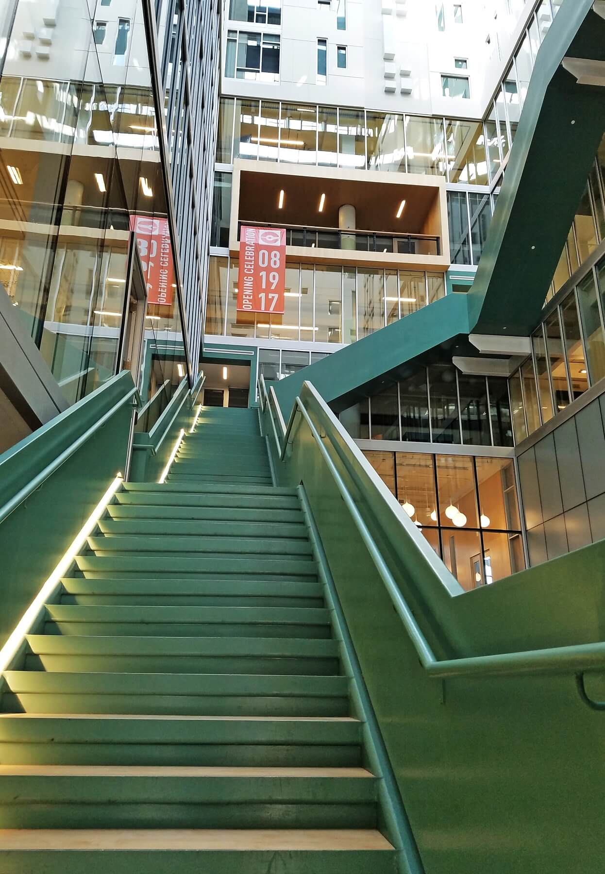 The striking green stairwell of the west atrium Crosstown Concourse — The striking green stairwell of the west atrium