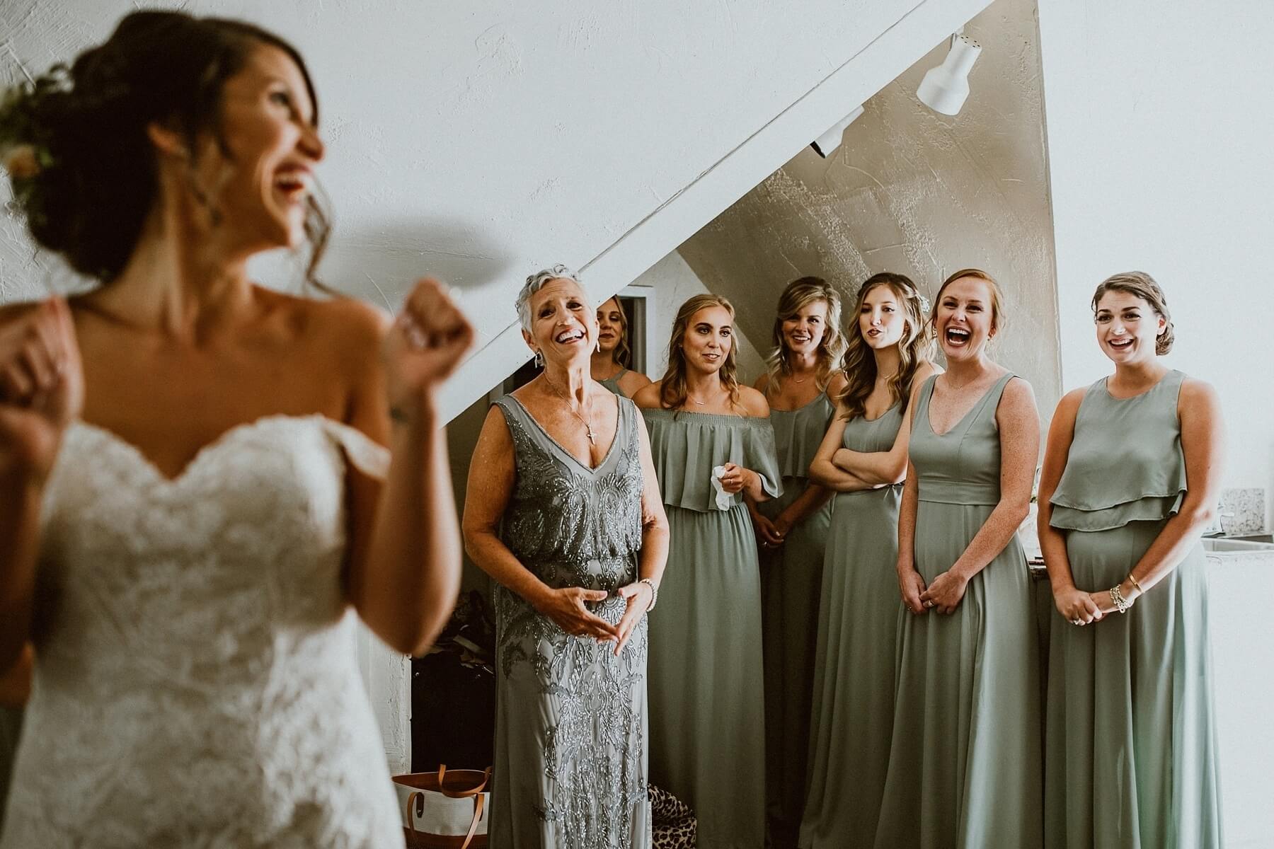 You can practically feel the joy in the room when Martha’s mom and bridesmaids see her in her dress for the first time!