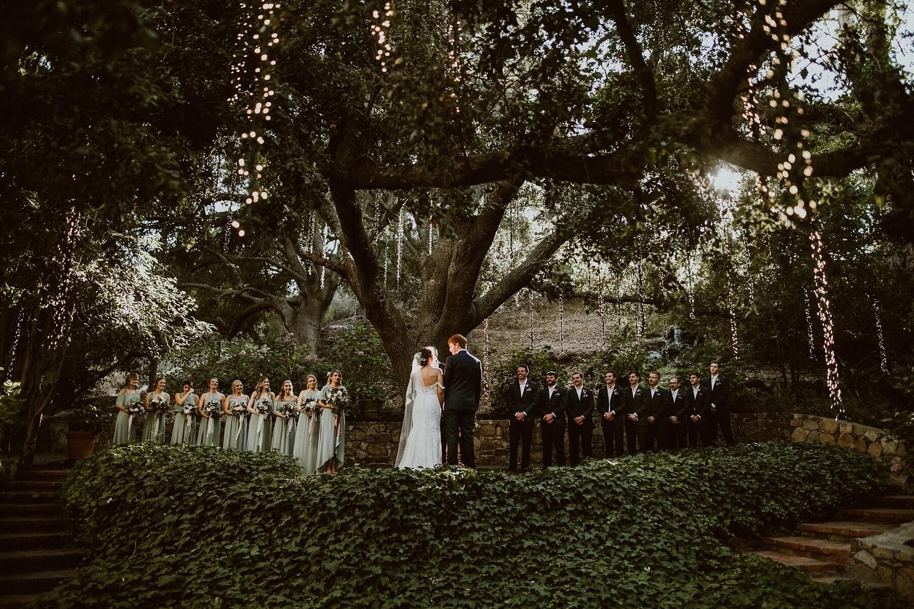 Martha and Andrew met under the sweeping branches of a 100-year-old oak tree on August 12, 2017, to exchange vows as the sun was just starting to set over the Santa Monica mountains.