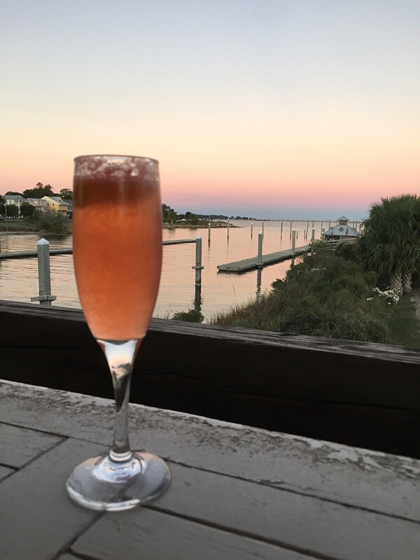 Ask for the Glass of Sunshine at The Deck Bar, next door to The Fish House. This specialty drink is a lovely mash-up of vodka, Limoncello, fresh strawberries, fresh-squeezed citrus, and champagne.