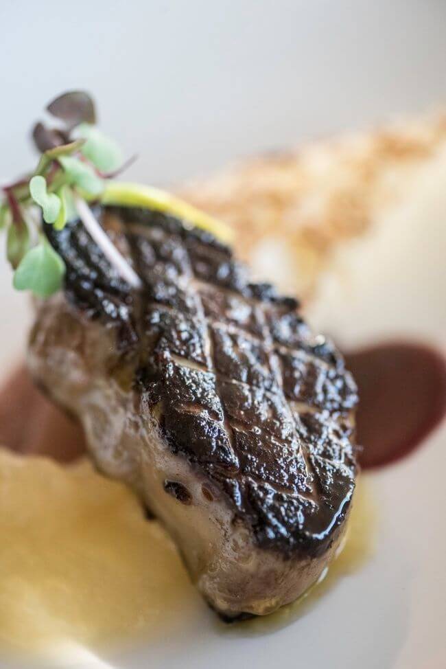 Seared foie gras with apple puree and brioche. “David’s Foie Gras is a staple for us,” says co-owner Nick Scott when asked of his favorite dishes on the menu. The presentation changes daily at the whim of Chef Krog. Image: Jay Adkins via Interim interim