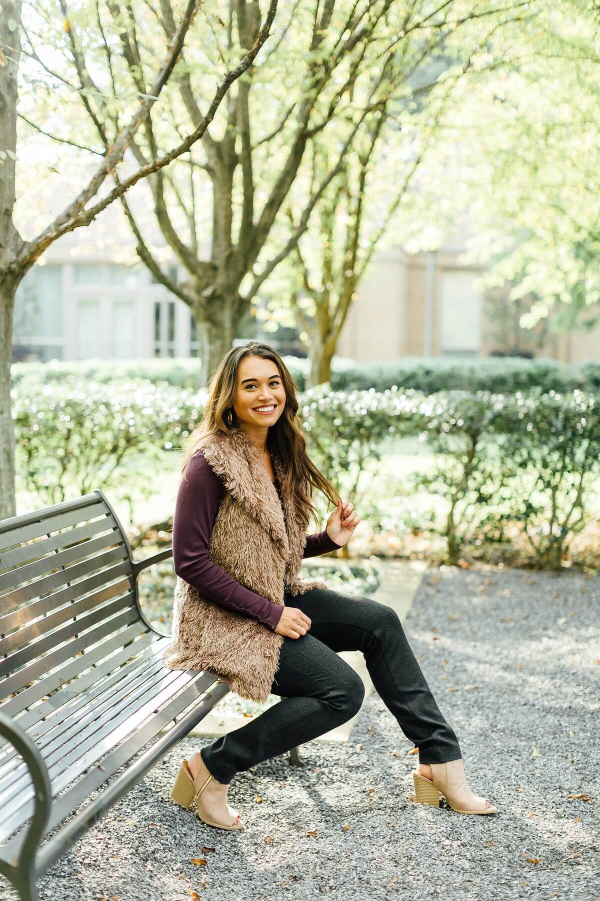 On Christi, from Southern Muse: Fig chaser scoop tee, $53; Chamonix fur vest, $275; Ecru casto pant, $170; Catherine Page hoops, $95; zoWee tourmaline necklace with tassel, $171